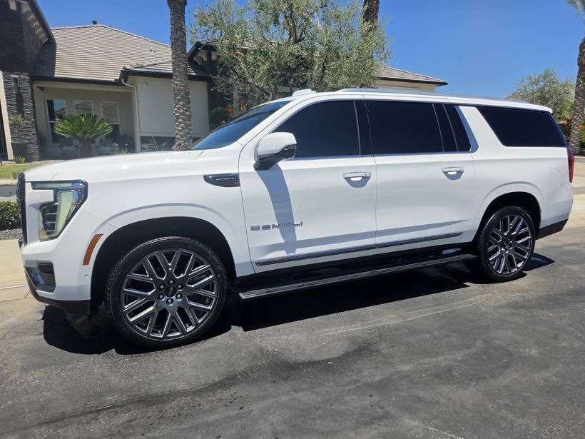 White GMC Yukon Denali after a detail